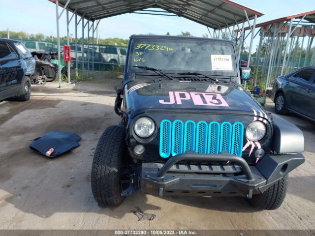 1C4BJWDG1EL108049 Jeep Wrangler Unlimited Sport