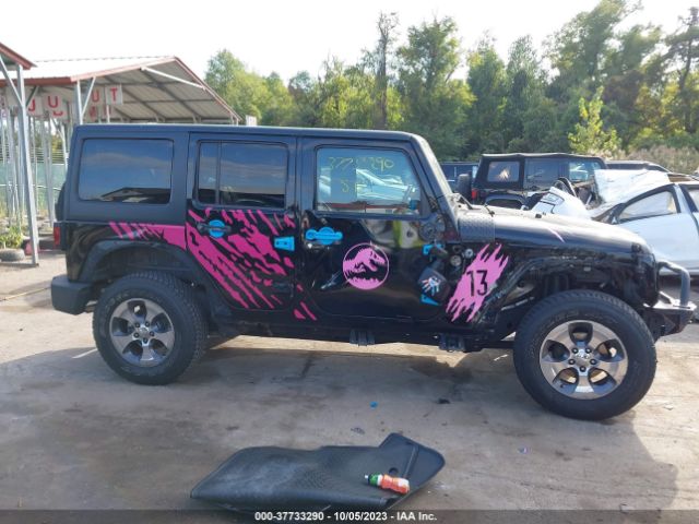 1C4BJWDG1EL108049 Jeep Wrangler Unlimited Sport