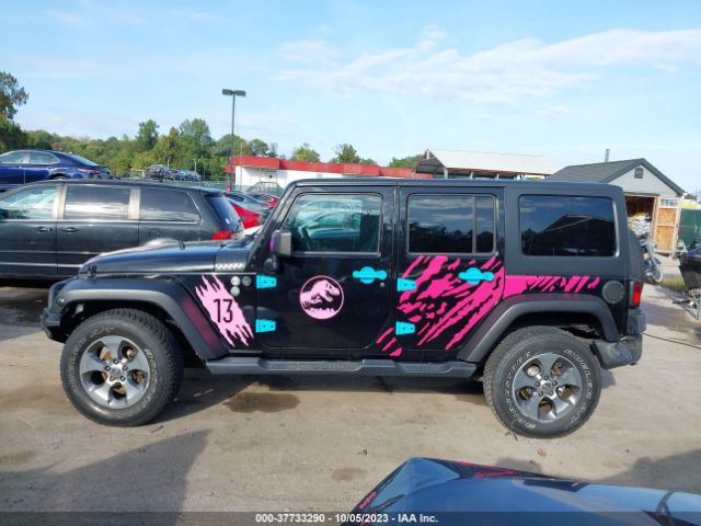 1C4BJWDG1EL108049 Jeep Wrangler Unlimited Sport