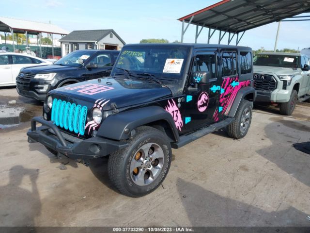 1C4BJWDG1EL108049 Jeep Wrangler Unlimited Sport