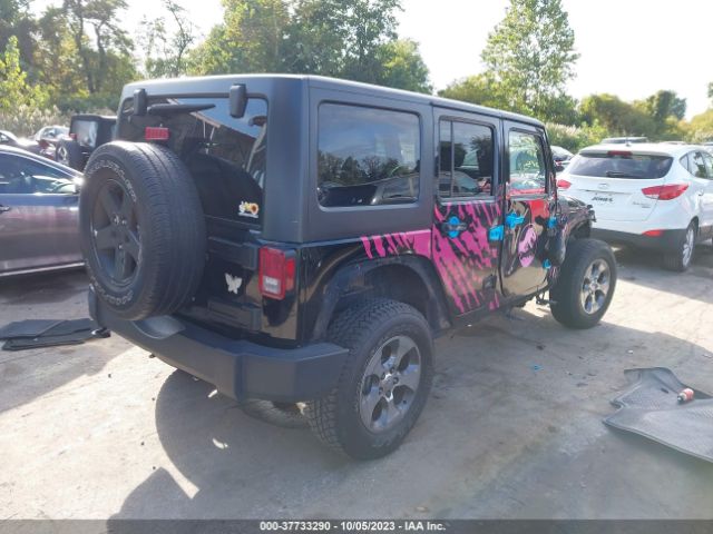 1C4BJWDG1EL108049 Jeep Wrangler Unlimited Sport
