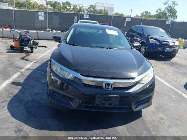 2HGFC2F54GH543388 Honda Civic Sedan Lx