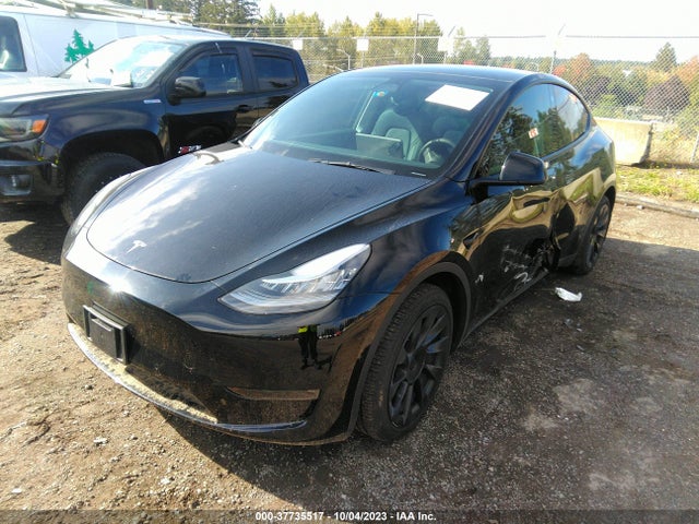 Tesla Model Y Long Range 2022 7SAYGAEE9NF571989 Image 2