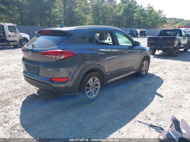 2018 HYUNDAI TUCSON KM8J3CA42JU602841 Photo 3