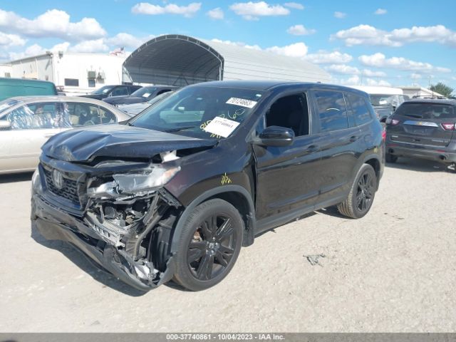 5FNYF7H2XKB010863 Honda Passport Sport