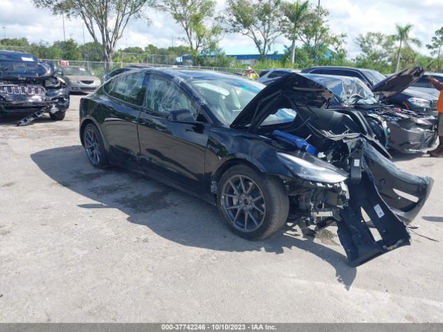 2022 TESLA MODEL 3 5YJ3E1EB4NF265589