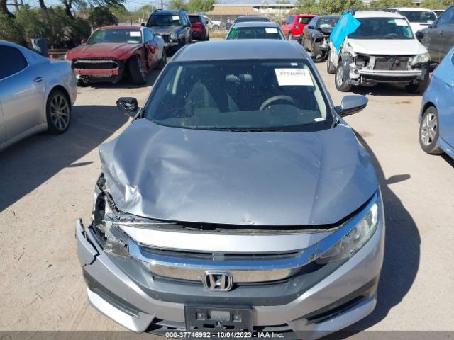 2HGFC2F58JH524964 Honda Civic Sedan Lx