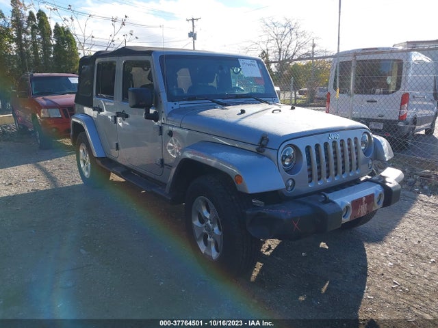 2014 JEEP WRANGLER UNLIMITED SAHARA VIN: 1C4HJWEGXEL173412