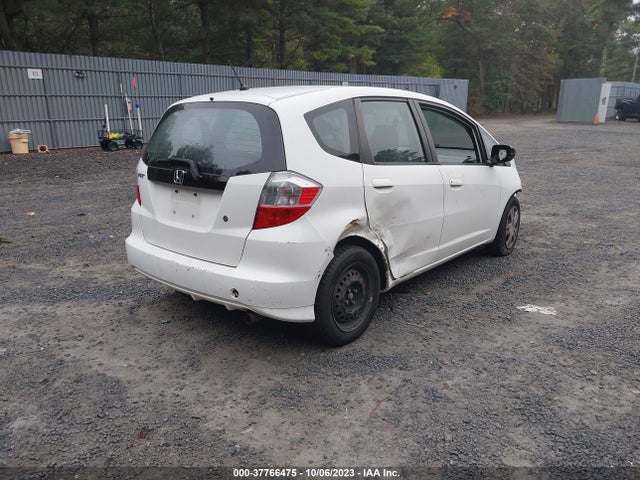 2010 HONDA FIT VIN: JHMGE8H25AS003727