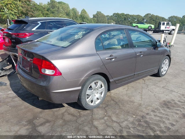2010 HONDA CIVIC SDN LX VIN: 19XFA1F59AE025357