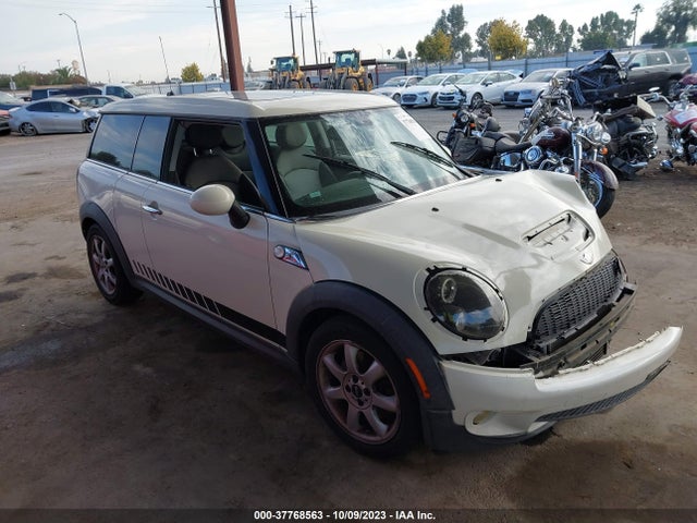 2009 MINI COOPER CLUBMAN WMWMM33599TP91295 Photo 0