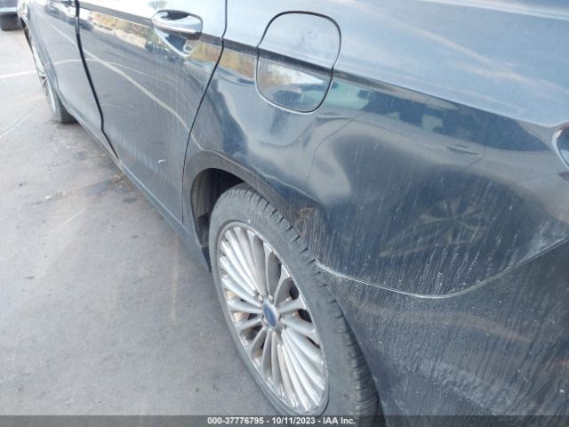 3FA6P0K99ER380518 Ford Fusion Titanium