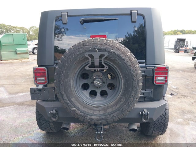 2010 JEEP WRANGLER UNLIMITED SAHARA VIN: 1J4HA5H10AL142322