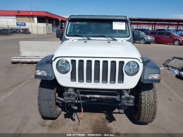 1C4HJXDG0JW112425 Jeep Wrangler Unlimited Sport S