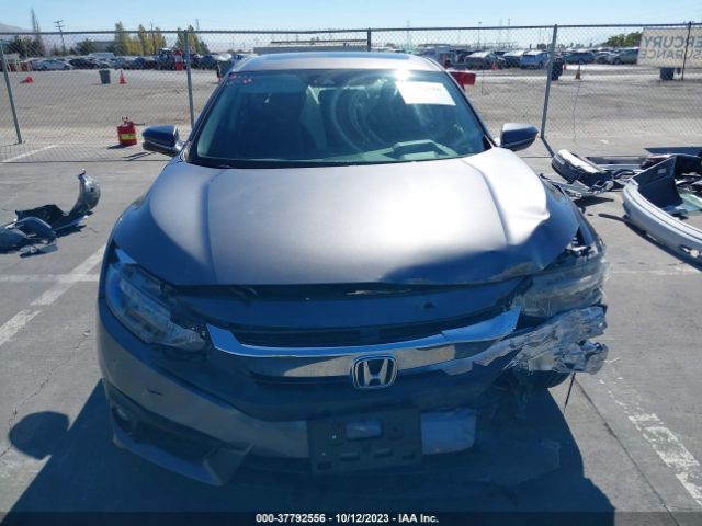 JHMFC1F93JX019162 Honda Civic Sedan Touring