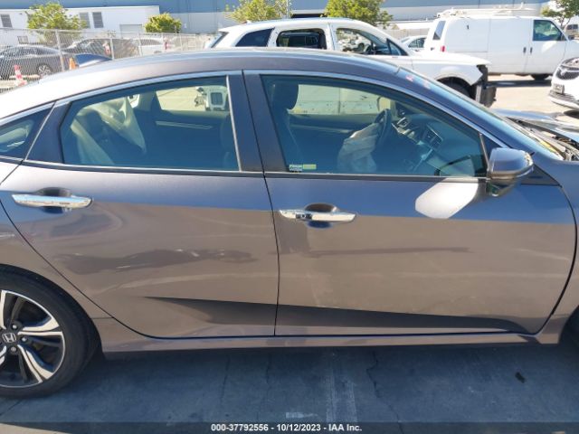 JHMFC1F93JX019162 Honda Civic Sedan Touring