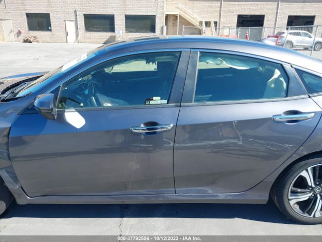 JHMFC1F93JX019162 Honda Civic Sedan Touring