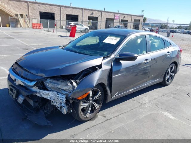 JHMFC1F93JX019162 Honda Civic Sedan Touring