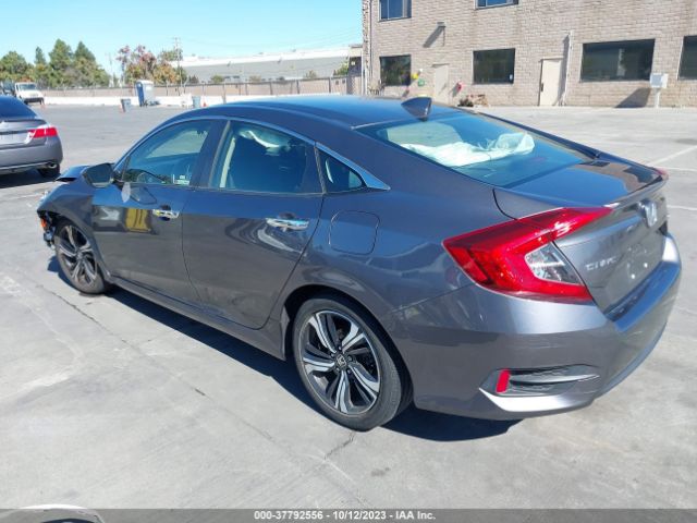 JHMFC1F93JX019162 Honda Civic Sedan Touring