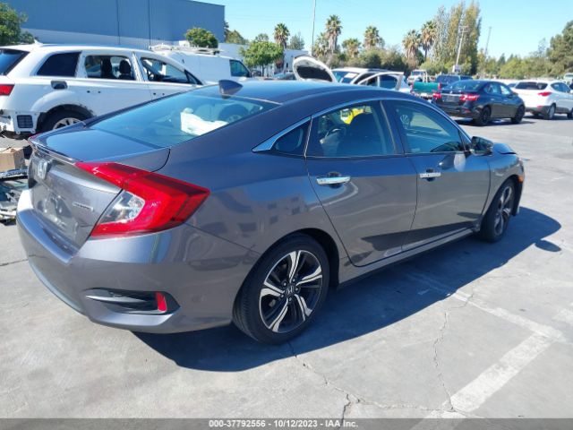 JHMFC1F93JX019162 Honda Civic Sedan Touring