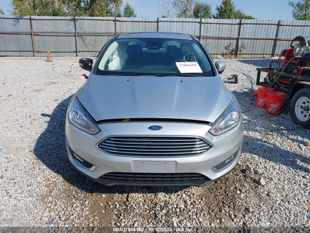 2017 FORD FOCUS TITANIUM VIN: 1FADP3J26HL339991