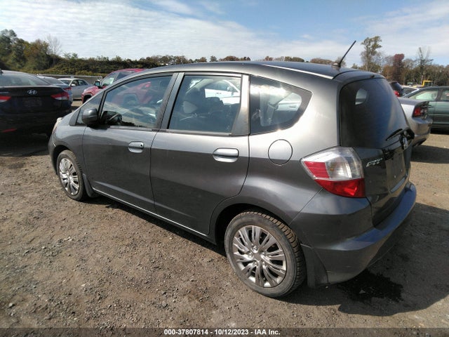 2012 HONDA FIT VIN: JHMGE8H38CC010936