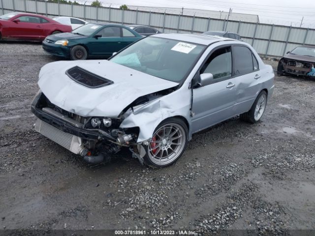 2005 MITSUBISHI LANCER EVOLUTION JA3AH86D75U053038 Photo 1