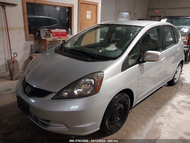 2012 HONDA FIT VIN: JHMGE8H33CS008811