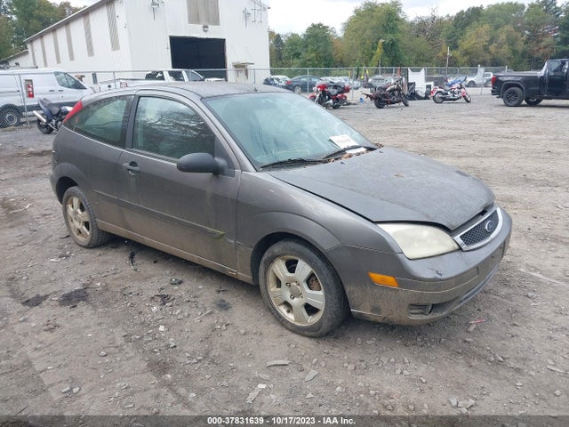2007 FORD FOCUS 1FAFP31N97W153121 Photo 0