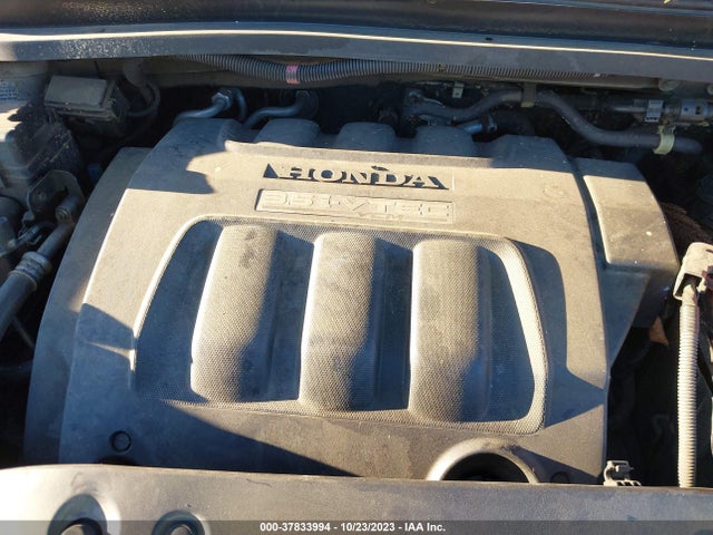 2007 HONDA ODYSSEY EX-L VIN: 5FNRL38737B403421