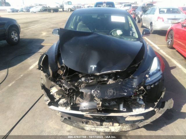 5YJ3E1EA7KF425306 Tesla Model 3 Range