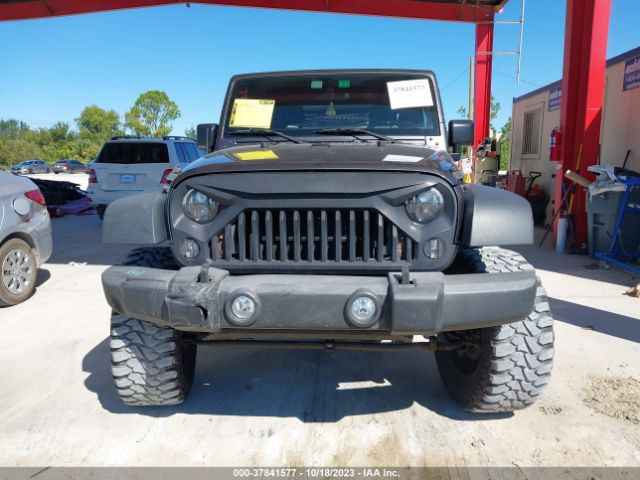 1C4AJWAG4GL165848 Jeep Wrangler Sport