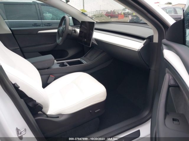 2023 TESLA MODEL Y 7SAYGDEF0PF705298 Photo 4