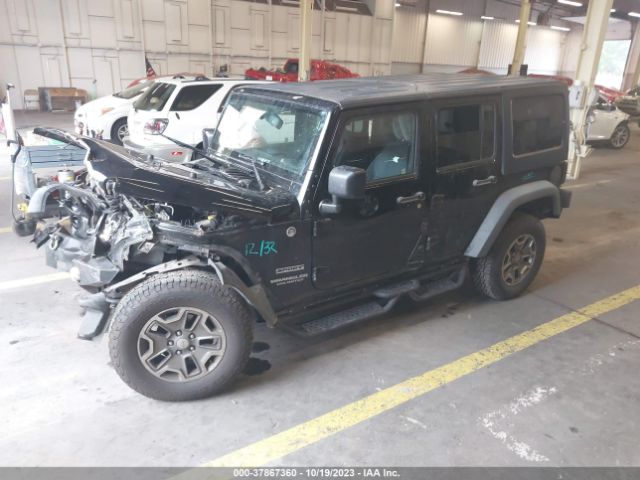 1C4BJWDG3EL232498 Jeep Wrangler Unlimited Sport