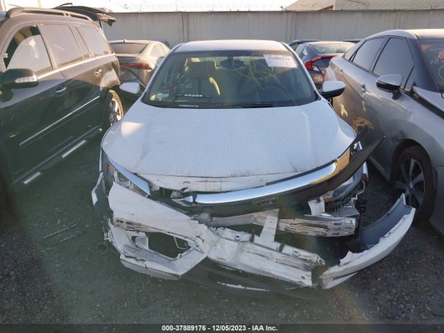 2HGFC2F51JH587114 Honda Civic Sedan Lx