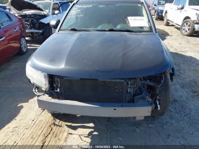 1C4NJDBB9ED568031 Jeep Compass Sport