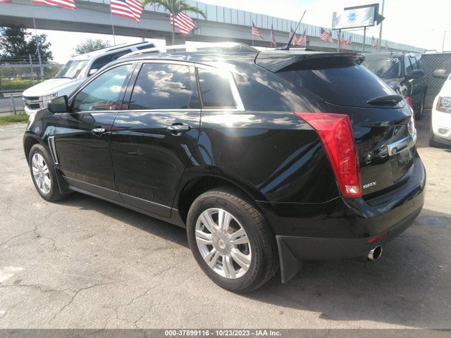 2014 CADILLAC SRX LUXURY COLLECTION VIN: 3GYFNBE3XES523174