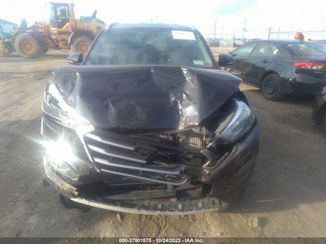 KM8J3CA27HU297023 Hyundai Tucson Sport