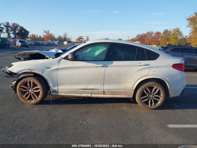 5UXXW7C55J0W64517 BMW X4 M40i