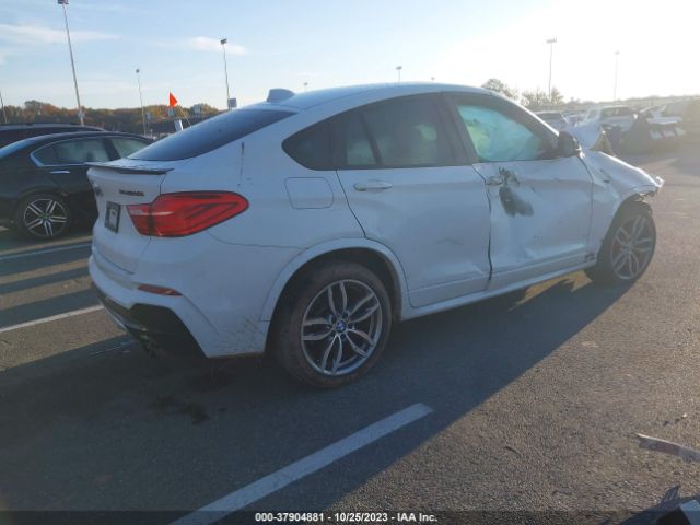 5UXXW7C55J0W64517 BMW X4 M40i