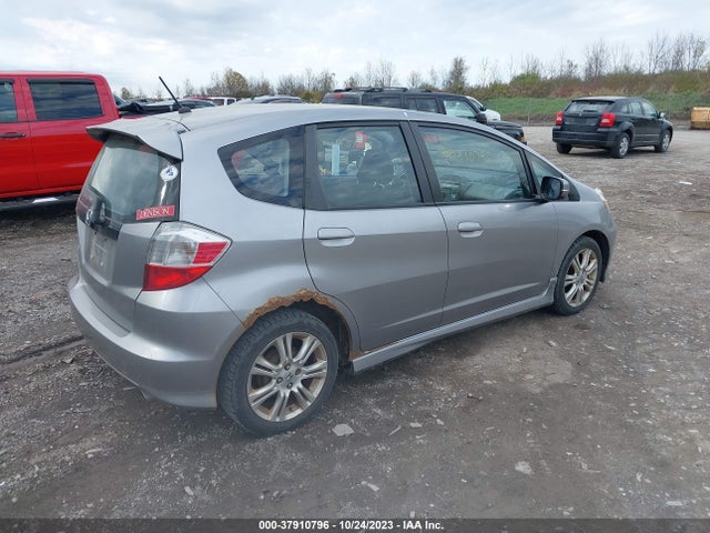 2009 HONDA FIT SPORT VIN: JHMGE87449S014975