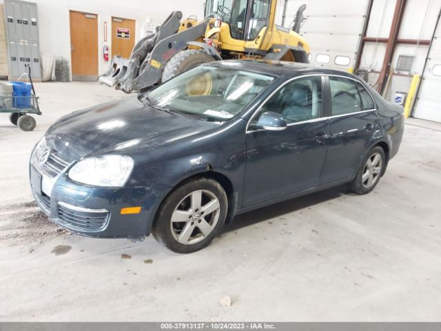2009 VOLKSWAGEN JETTA 3VWRM71K69M138802 Photo 1