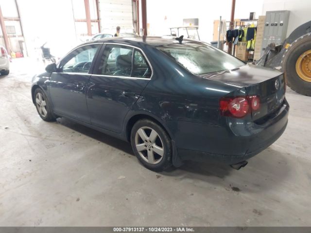 2009 VOLKSWAGEN JETTA 3VWRM71K69M138802 Photo 2