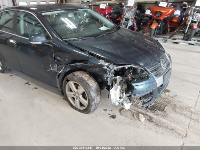 2009 VOLKSWAGEN JETTA 3VWRM71K69M138802 Photo 5