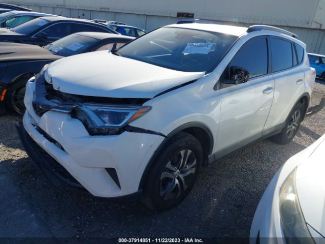 2017 TOYOTA RAV4 JTMBFREV2HJ147555 Photo 1