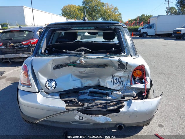2010 MINI COOPER HARDTOP VIN: WMWMF3C57ATZ27907