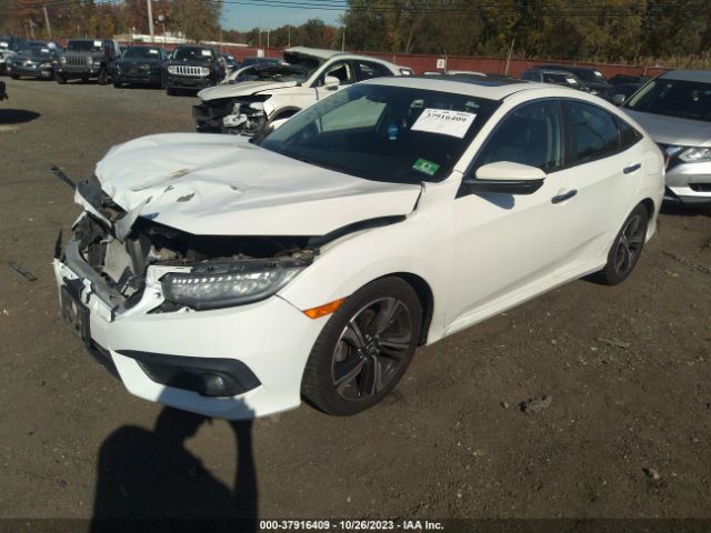2HGFC1F9XGH655173 Honda Civic Sedan Touring