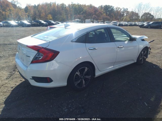 2HGFC1F9XGH655173 Honda Civic Sedan Touring