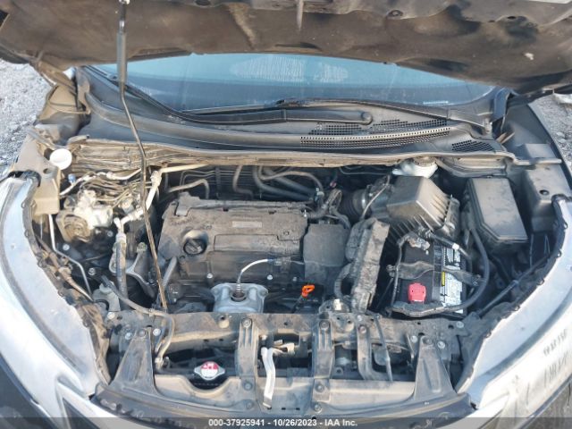 2HKRM4H38GH600859 Honda CR-V LX