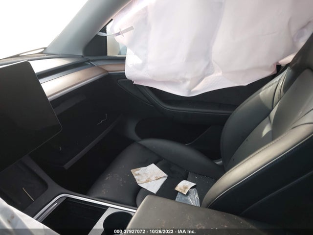2023 TESLA MODEL Y 7SAYGAEE8PF705524 Photo 4